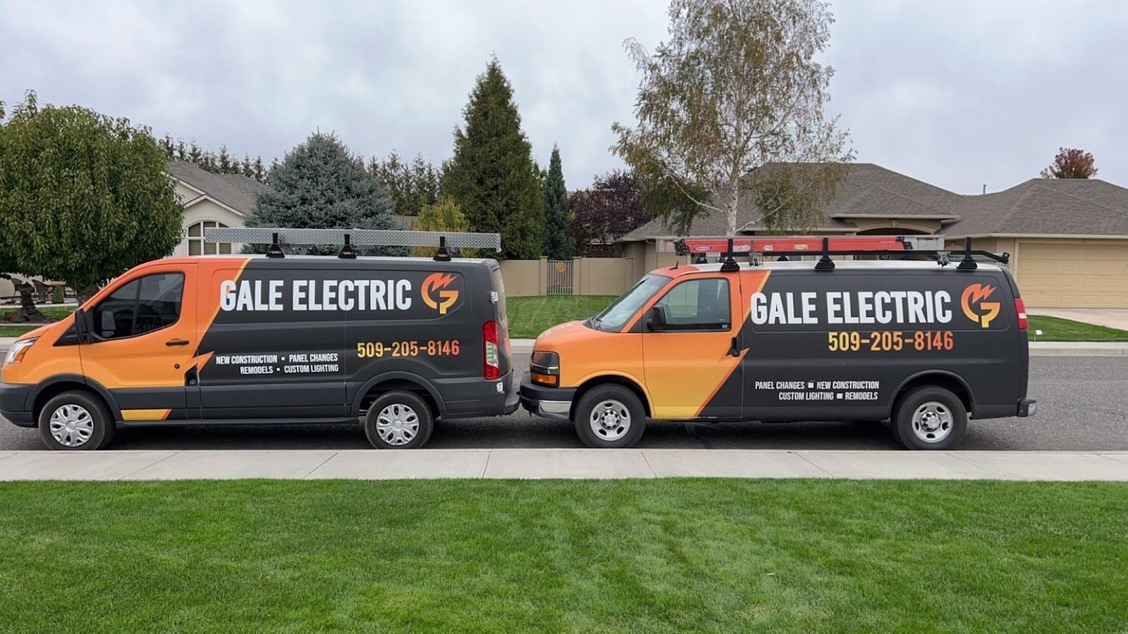 Two branded Gale Electric service vans